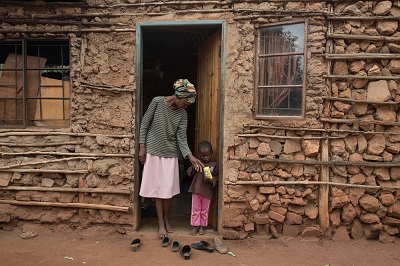 Falakhe, the son of Winile’s neighbours, started to learn sign language with her. Winile (left) became deaf due to the side effects of the treatment.