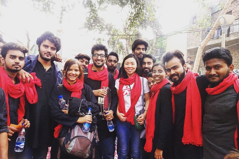 Virginia at an event raising awareness about gender-based violence and the services of the MSF supported-clinic. She's with students from Delhi university who are part of a street theatre group working with MSF to raise awareness. © Virgina Lee / MSF