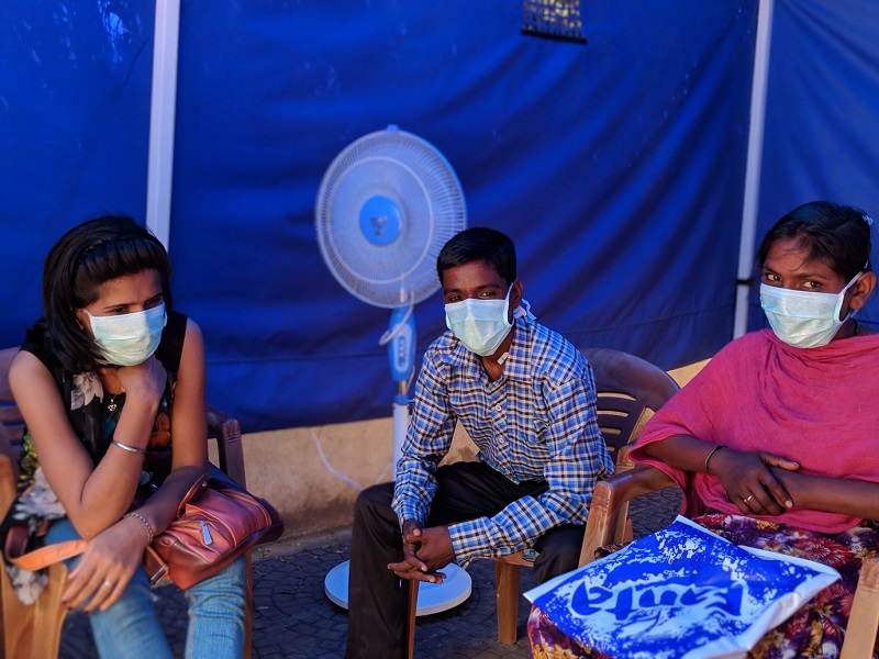 Vikas speaking in a peer support group meeting and shares his experience of completing the 7 km race as part of Airtel Mumbai Marathon 2018. Rekha and Pooja look on. Photo Credit: Padma Priya/MSF