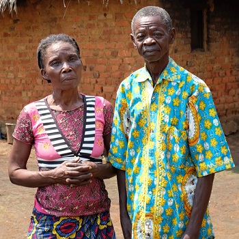 Marie-Vincent poses with her husband outside their house. Photo: MSF
