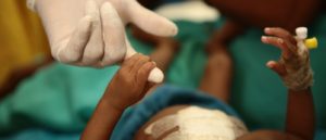 A 9-month-old patient with her mother receiving treatment at MSF’s mother and child healthcare centre in Bijapur