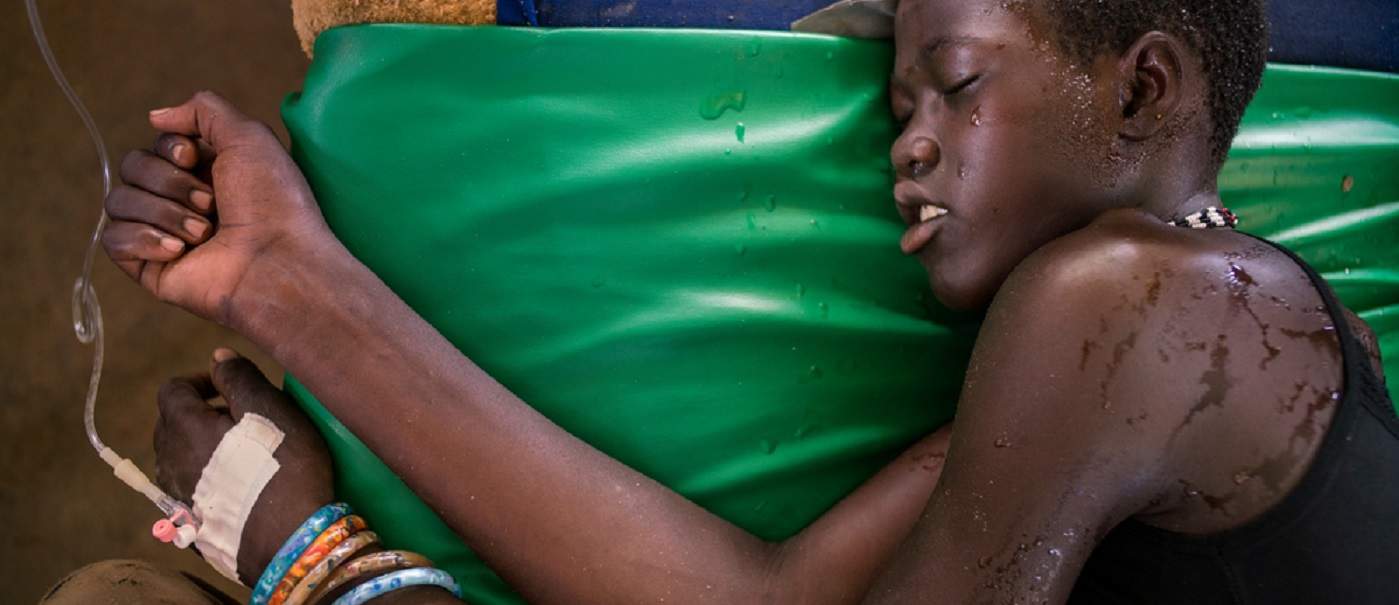 Abuk Akuoc, 18, receives an IV treatment of quinine for her severe malaria at the government-run health centre in Panthou. Photo:Diana Zeyneb Alhindawi