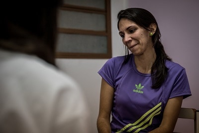 Yaneiri’s husband was murdered in front of their house while leaving for work. For a couple of months, she has been attending therapy sessions with an MSF psychologist. Photo: Marta Soszynska/MSF