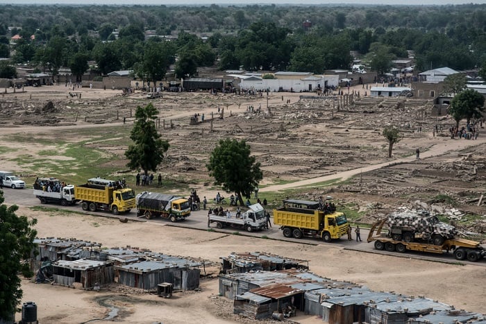 A security convoy prepares to leave the internally displaced persons camp in Banki, in the northeast of Nigeria.