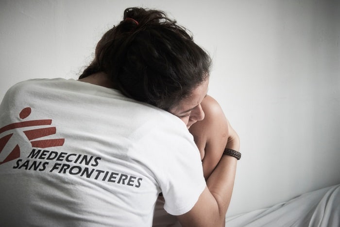 Cinthya, 18, receives a hug from an MSF nurse at the Choloma clinic for medical and mental healthcare, after suffering domestic violence. She is two months' pregnant. MSF is supporting a mother and child clinic in Choloma, a rapidly expanding industrial area now the third most populous city in Honduras and notorious for its high level of violence.