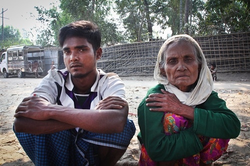 Noor Lamin, 25, and his 70-year-old mother Subi Katum arrive near Sabrang on the Bangladeshi side of the Naf river after crossing the border from Myanmar on 7 March 2018. Photo: Sara Creta/MSF