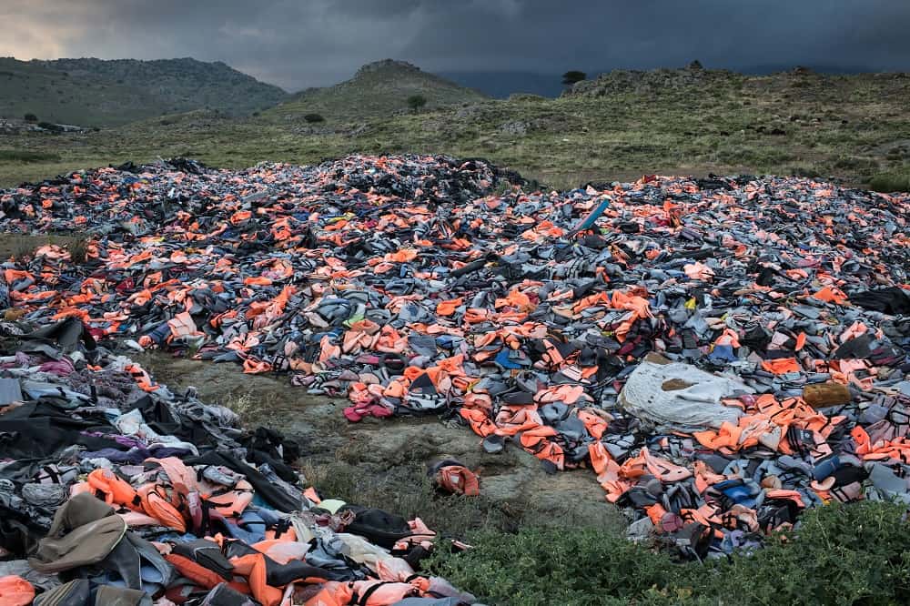Thousands of life jackets left behind by arriving migrants are gathered at a dump on Lesbos Island, Greece.