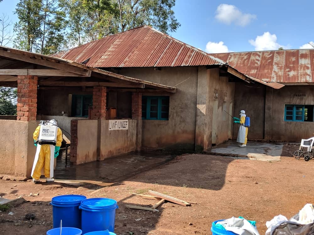 MSF watsan teams decontaminating the Mangina Health Centre. This is where the isolation of suspected and confirmed Ebola patients was done before MSF arrived
