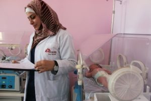 Newborn Syrian baby Zain Al-Abideen receives care from an MSF nurse in the neonatal unit at the mother and child hospital in Irbid, Jordan. &copy; Enass Abu Khalaf-Tuffaha/MSF