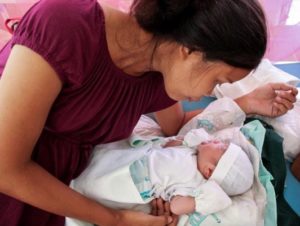 Justin James Warren, the first Baby born in the maternity ward of MSF in Guiuan, one of the areas hit hard by Typhoon Haiyan in the Philippines. Photo: &copy; Baikong Mamid/MSF