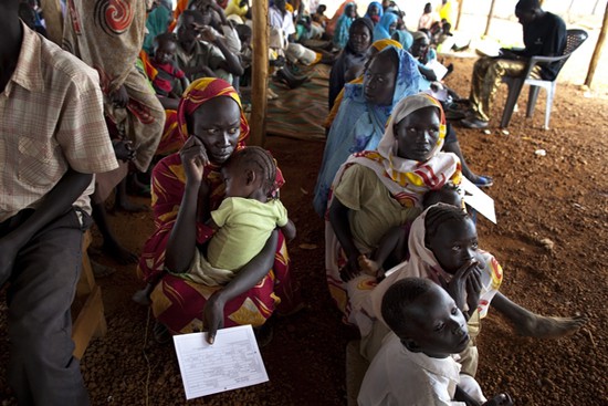 Sudanese refugees wait in line in the outpatient department at the MSF field hospital in Jamam refugee camp, South Sudan. South Sudan 2012 © Paula Bronstein/Getty Images