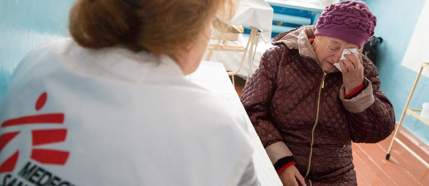 Tamara Artyomovna, 73 years old, during a consultation with Galina Mizina, MSF psychologist. Photo: Maurice Ressel