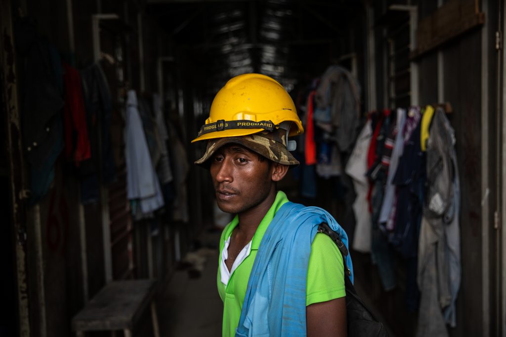 This man works on a construction site, where he lives in a container with several other Rohingya workers in the Bayan Lepas district of Penang, Malaysia. April 2019. © ARNAUD FINISTRE