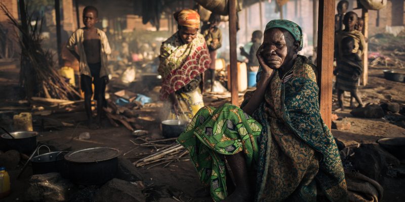 Teresia, 70, widow, cooks outside the parish, DRC, November 2019. © ALEXIS HUGUET