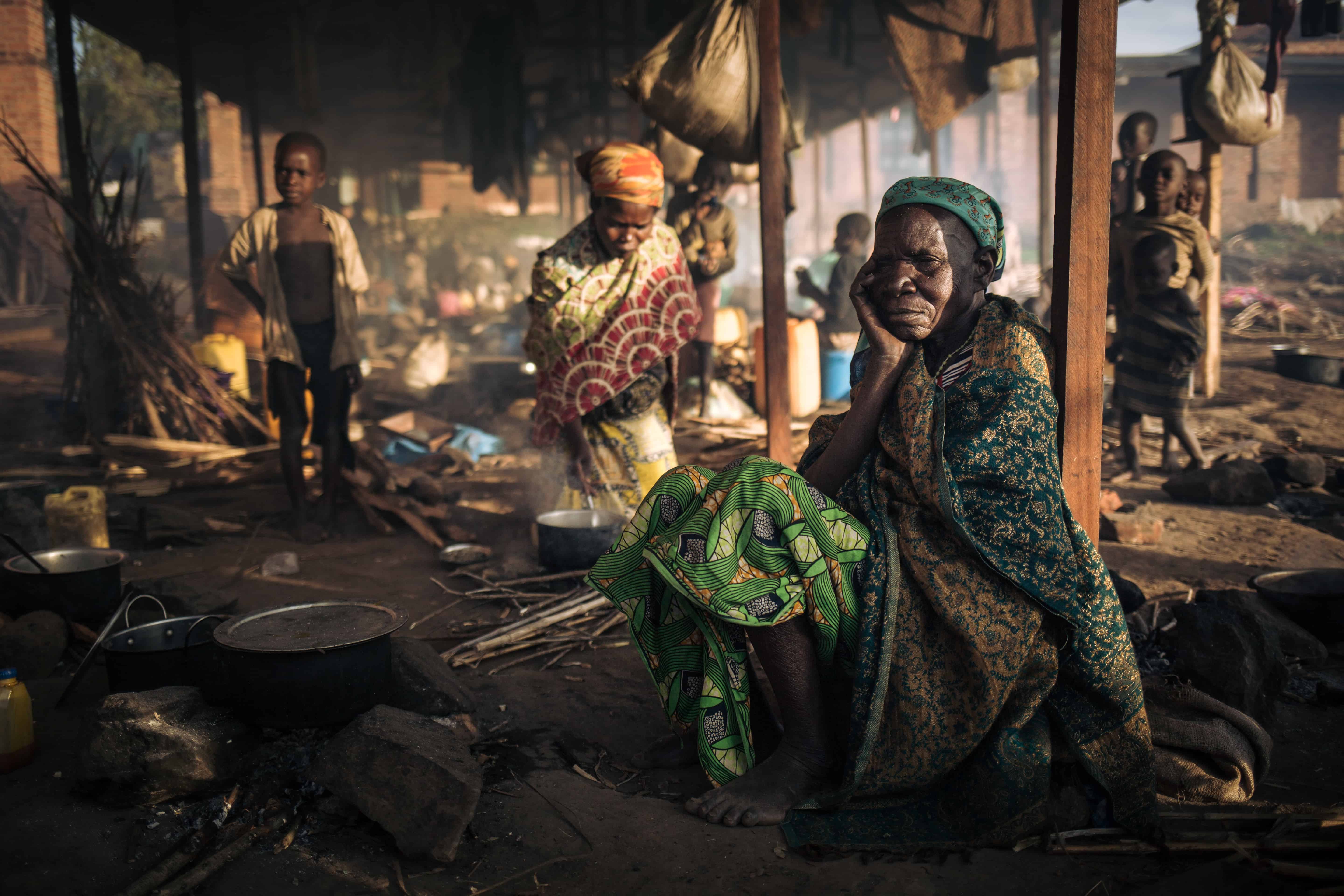 Teresia, 70, widow, cooks outside the parish, DRC, November 2019. © ALEXIS HUGUET