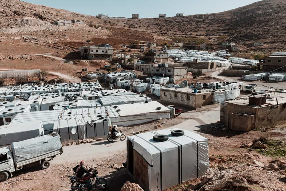 In Arsal, located at 1,500 metres altitude, snow and freezing temperatures are common during the winter months. The family’s shelter made of cement blocks and plastic sheeting will hardly protect them from these harsh conditions. Lebanon, December 2020. © KARINE PIERRE/HANS LUCASINSTAGRAM: @PICS_STONE