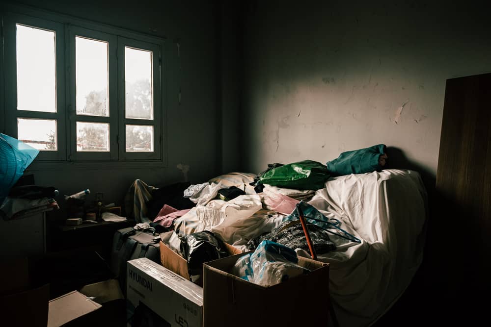 “The blast destroyed all the windows in the apartment, as well as my bed and some shelves. I’m now sleeping on the couch in my living room and I’m using the bedroom to store all the damaged furniture”, says Thérèse.  Lebanon, December 2020. © KARINE PIERRE/HANS LUCASINSTAGRAM: @PICS_STONE
