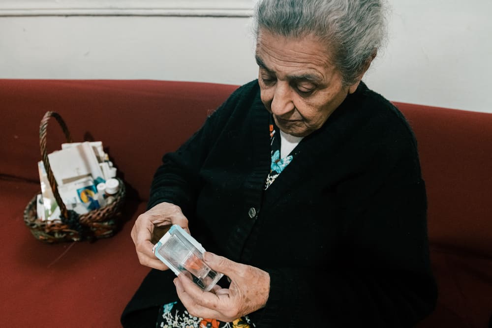 Thérèse was recently diagnosed with diabetes and her hypertension has increased. “I think this is all linked to the explosion. I take my medicines carefully every day because I couldn’t afford the hospital fees if I should have any serious medical issues.”  Lebanon, December 2020. © KARINE PIERRE/HANS LUCASINSTAGRAM: @PICS_STONE