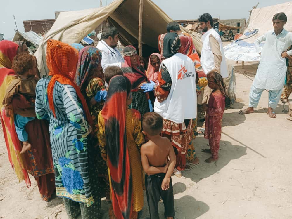 An MSF health promoter is conducting a health session on mother and child health at an IDPs camp in Dera Murad Jamali administration/district.