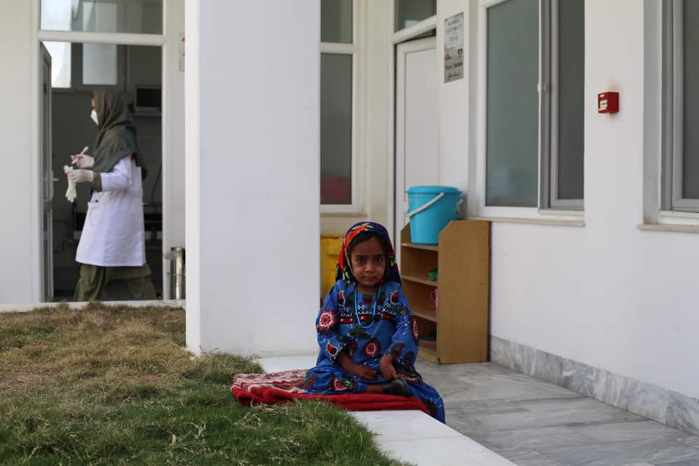 Nine-year-old Bibi Fazlia on the women's inpatient ward at the Médecins Sans Frontières (MSF) drug-resistant tuberculosis (DR-TB) hospital in Kandahar city, Kandahar Province, Afghanistan.

Bibi Fazlia was taken to a private hospital in Lashkar Gah city, Helmand, and they conducted tests before sending her to the Mirwais Regional Hospital in Kandahar where she was admitted for one month before being referred to the Médecins Sans Frontières (MSF) drug-resistant tuberculosis (DR-TB) hospital in Kandahar city for TB treatment. She has been receiving treatment here for 18 months.