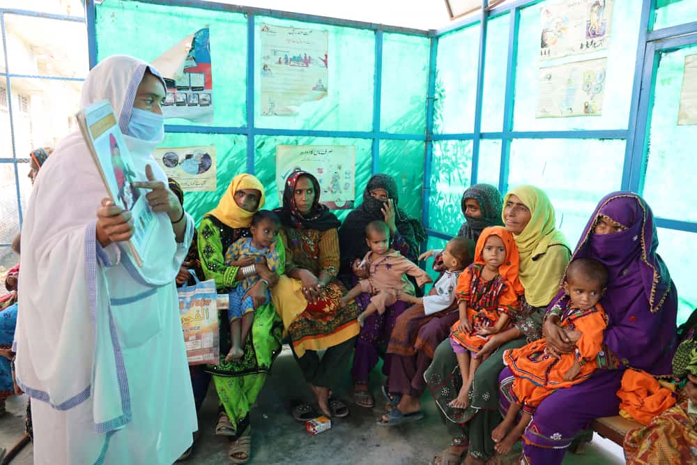 An MSF staff is conducting a health education session with the mothers at MSF’s outpatient therapeutic feeding centre in Jaffarabad, Eastern Balochistan.