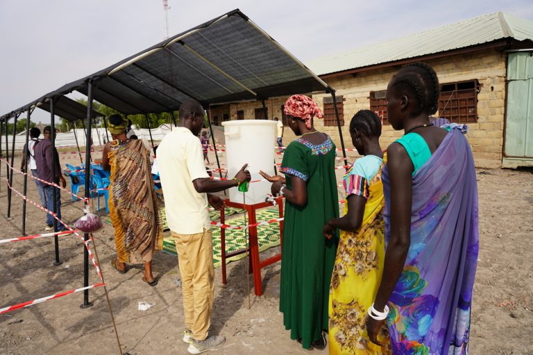 Women queue to receive hepatitis E vaccines at Hai Matar, Jonglei State.