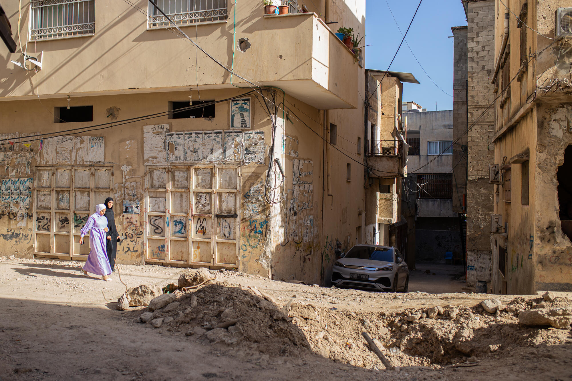 During the last incursion, it is estimated that Israeli forces destroyed 70% of the road infrastructure as well as the access to electricity and water. One week after the military forces withdrew, population still struggles to access clean water as many of the pumps were cut and water tanks were shot. 

Many houses in Jenin refugee camp are covered with bullet holes. Residents talk about recurrent house occupations from Israeli militaries who also occupy strategic positions to dig a hole to place their snipers.