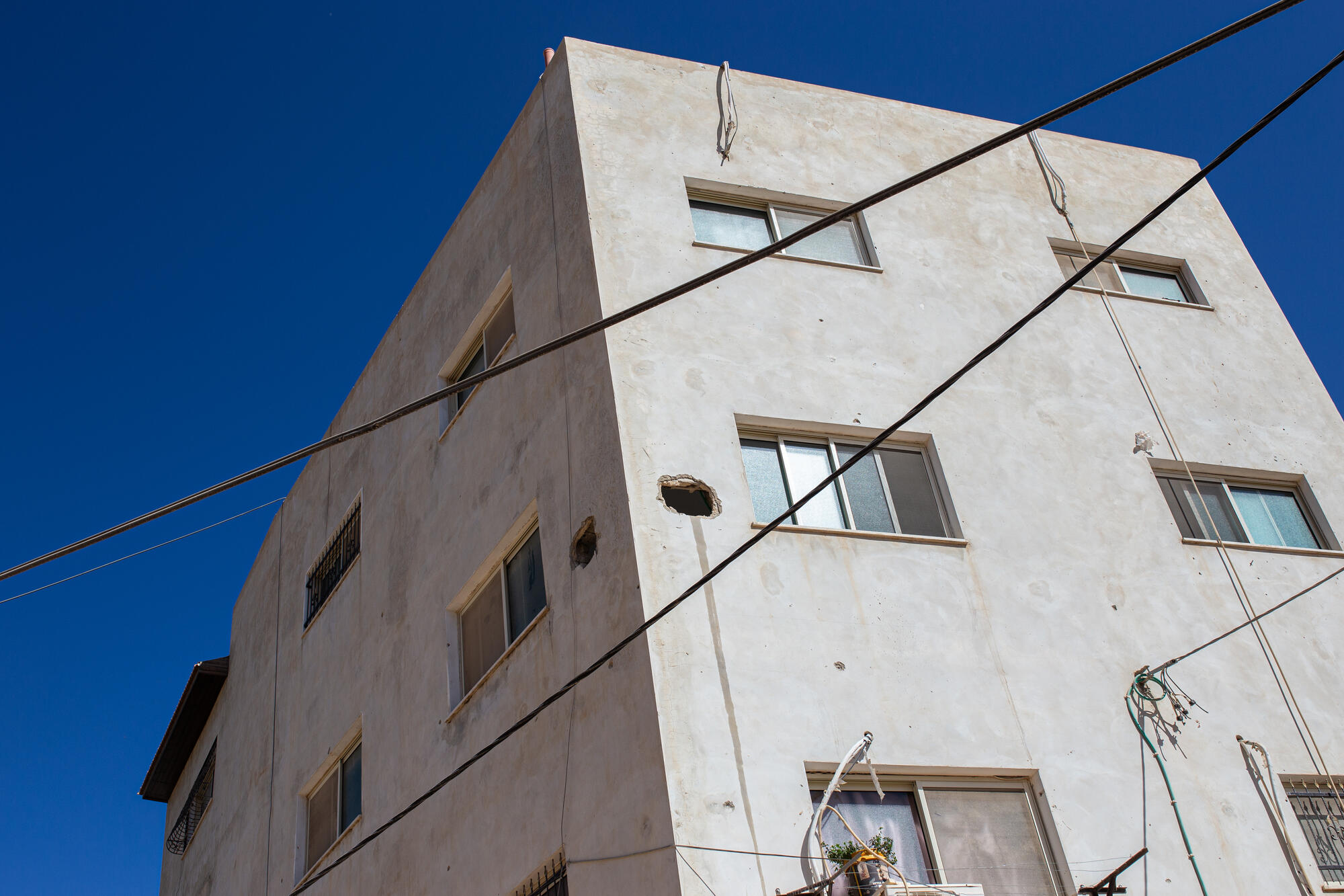 During the last incursion, it is estimated that Israeli forces destroyed 70% of the road infrastructure as well as the access to electricity and water. One week after the military forces withdrew, population still struggles to access clean water as many of the pumps were cut and water tanks were shot. 

Many houses in Jenin refugee camp are covered with bullet holes. Residents talk about recurrent house occupations from Israeli militaries who also occupy strategic positions to dig a hole to place their snipers.