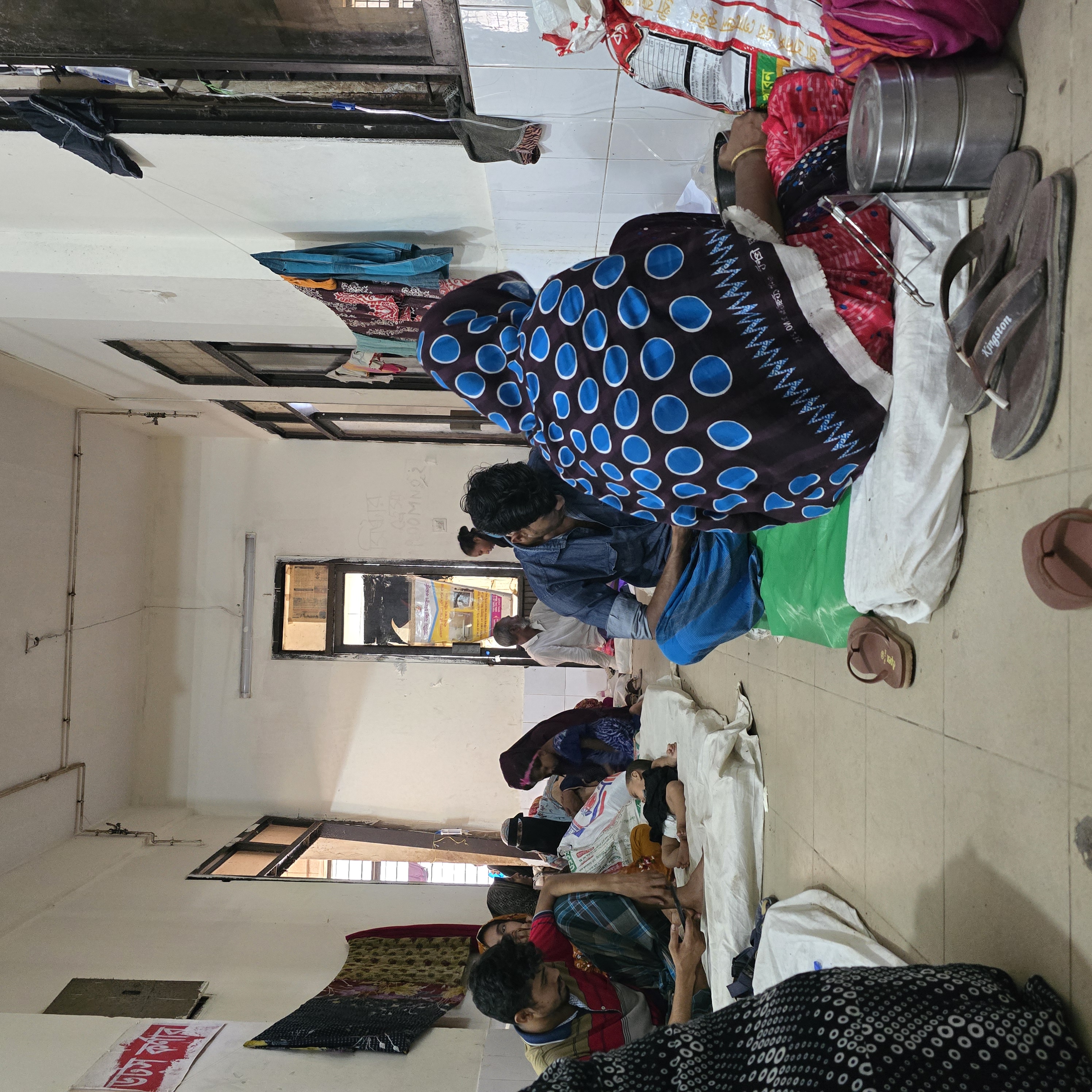 The paediatric diarrhea ward in Noakhali General Hospital. Due to increased numbers of acute watery diarrhea patients the 250-bed in-patient department was overwhelmed with patients. people were lined up on the floors and were more than one to a bed due to the influx of cases.
