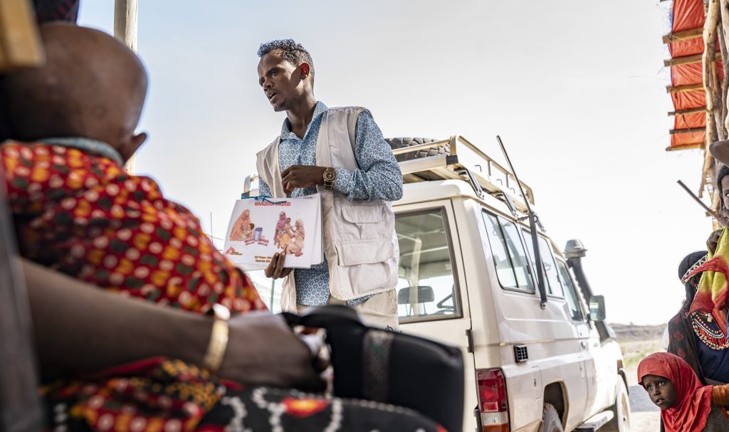 MSF staff doing a HP session to caretakers
