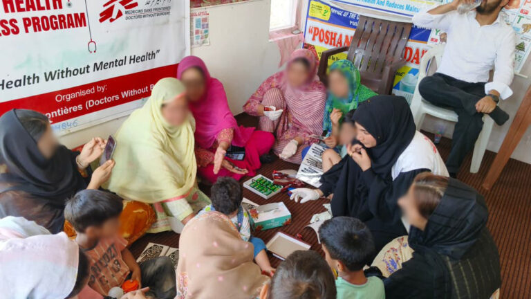 Women and children gather for a Doctors Without Borders India/Médecins Sans Frontières(MSF) mental health awareness session integrated with the community nutrition programme at one of the primary health centre in Kashmir, reflecting the message "no health without mental health". ©MSF