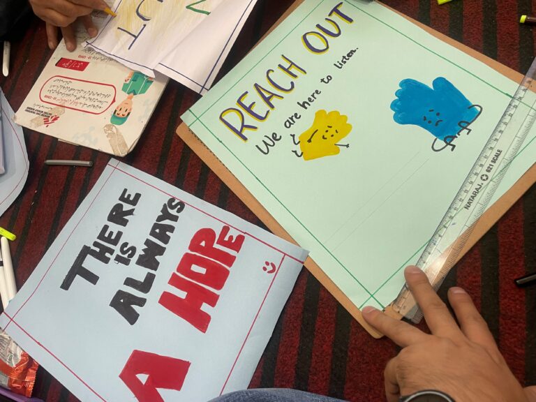 Hand-painted posters made by Doctors Without Borders India/Médecins Sans Frontières(MSF)'s health promotion team carry simple messages on suicide prevention and help-seeking behaviours, prepared for World Suicide Prevention Day in Kashmir. ©MSF
