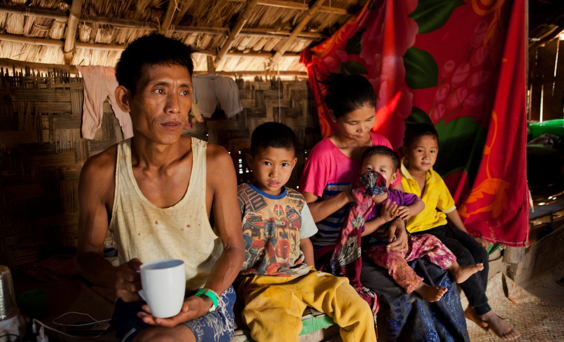 Thongsei Lupho Thongsei Lupho (44) and his wife Mary and some of their seven children. His son sitting next to him is also HIV-positive and receives treatment from the MSF clinic in Moreh. Thongsei is HIV positive and has been a patient at the MSF Clinic in Moreh since 2012. Thongsei used to work in charcoal and cultivation. Since he contracted HIV, his health has deteriorated and he is no longer able to do manual labour. He has seven children; the oldest is 17 years old and the youngest one 14 months old. Mary takes care of the children. Thongsei contracted HIV through drug use: Lupho had used drugs in the past to gain social acceptance in an area where tribal tensions had fostered a lack of trust amongst people. He first visited the MSF clinic because he thought he had TB. By that point, he had stopped taking drugs and married. He was in fact diagnosed HIV-positive. His failing strength meant he was no longer able to work. He was afraid of discrimination and isolated himself. He thought he could no longer mingle with other people in public spaces. His eldest daughter, Lamknohat, and several of his other children are also HIV-postive. Lamknohat feels ashamed and doesn’t want other people to know.